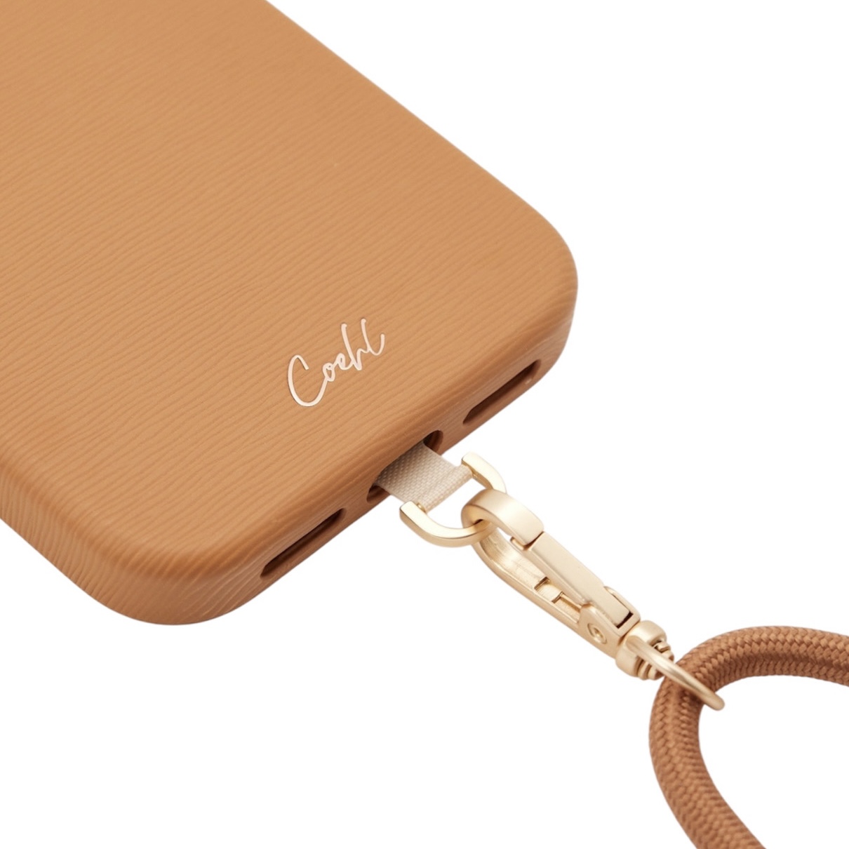 На фото изображено Чехол Uniq Coehl Strap Merelle (MagSafe) для iPhone 17 Pro, коричневый